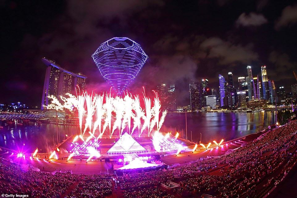 A light show erupts as Singaporeans celebrate the New Year tonight