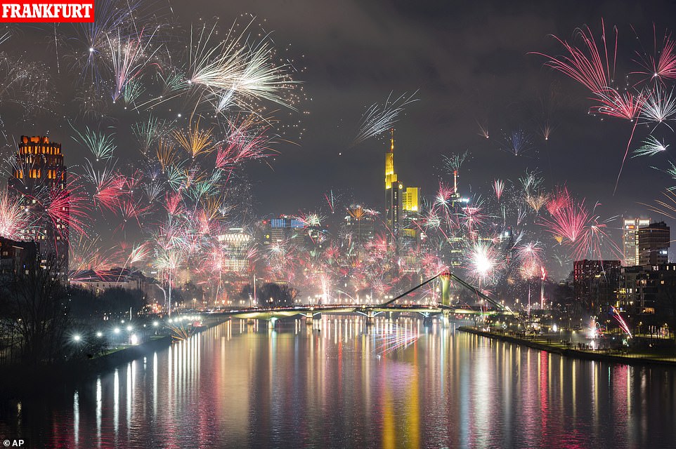 Fireworks light the sky during New Year celebrations in Frankfurt, Germany, Wednesday, January 1, 2020
