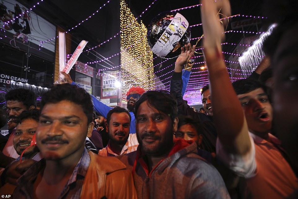 Revelers get together to celebrate on New Year's eve in Bangalore, India, Tuesday, Dec. 31, 2019
