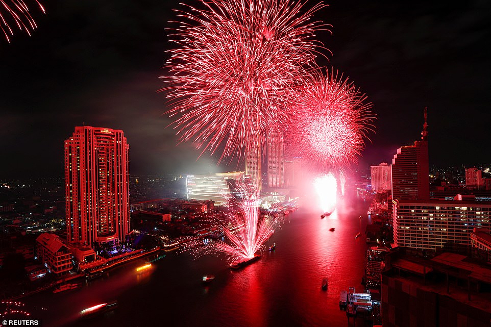 Fireworks explode over Chao Phraya River in Bangkok in a dazzling display to ring in 2020